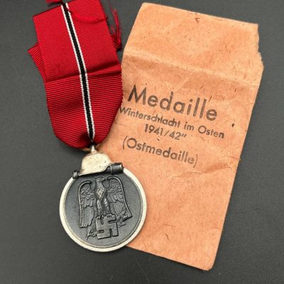 “Ostfront” medal with issue envelope and black wound badge. With documents for one person.