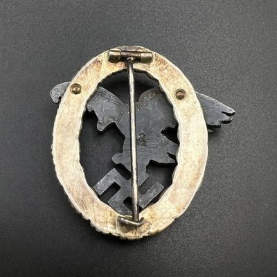 Observer Badge – Assmann.
