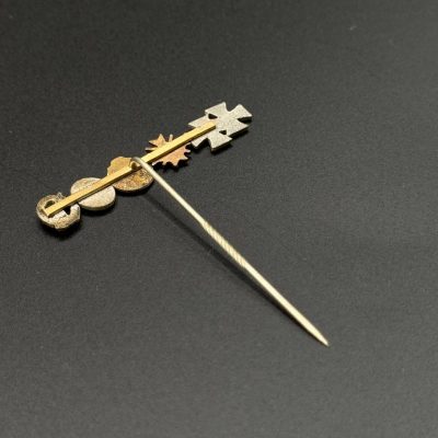 Five-Award Miniature Stickpin: EK2 1939, Ostmedaille, War Merit Cross, Infantry Assault Badge in Silver, Wound Badge in Silver. Post-war, 1957.